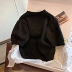 ビーズ付きアルファペットプリント黒ニットトップス