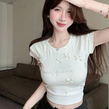 画像をギャラリービューアに読み込む, 半袖Tシャツ リボン装飾 刺繍ロゴ タイトシルエット 着痩せ 韓国コーデ 大人ガーリー トップス

