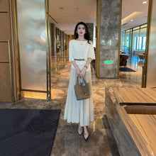 画像をギャラリービューアに読み込む, ニット トップス ＆ ロング スカート セットアップ（ベルト付き） 2点セット オフショルダー 半袖 プリーツスカート マキシ丈 体型カバー 大人可愛い 上品 ゆったり お出かけ 通勤 オフィス ファッション 美シルエット
