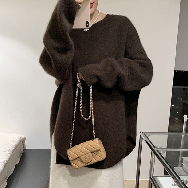 けだるい風スリットニットセーターリゾートコーデトップス