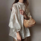 前後リバーシブル花柄シースルートラペットブラウストップス
