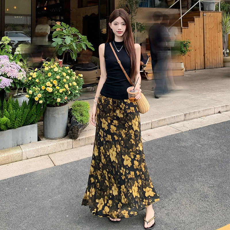 黒ノースリーブトップス＆花柄ロングスカートセットアップ