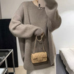 けだるい風スリットニットセーターリゾートコーデトップス