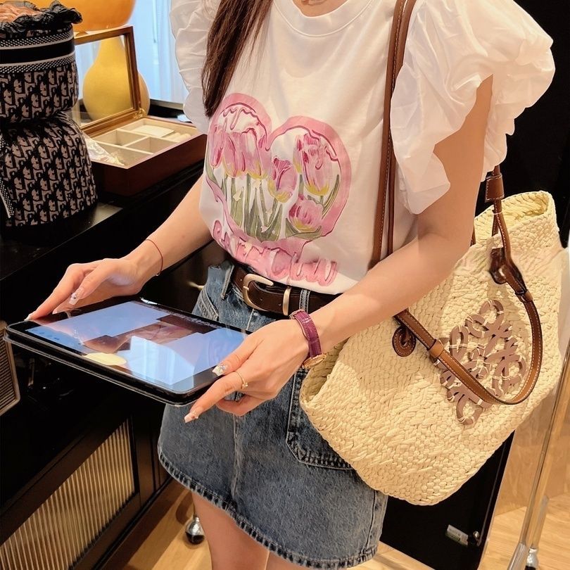 パフスリーブ花プリントＴシャツトップス