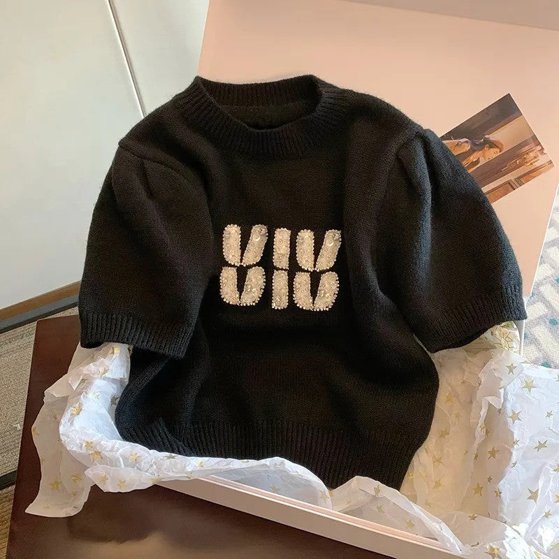 ビーズ付きアルファペットプリント黒ニットトップス