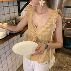 チェック柄フリル裾無袖トップス大人かわいいトップス